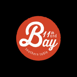 an 11th and bay logo with black background