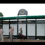 a picture of a golf scoreboard and a set of golfers